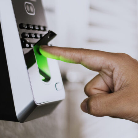 Scanning finger on a coronavirus contaminated fingerprint access control